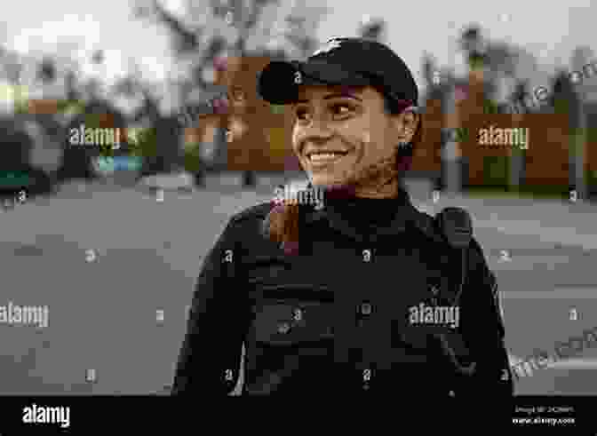 A Portrait Of Mary Alford, A Police Officer In Uniform, Smiling And Looking Resolute. To Serve And Protect Mary Alford