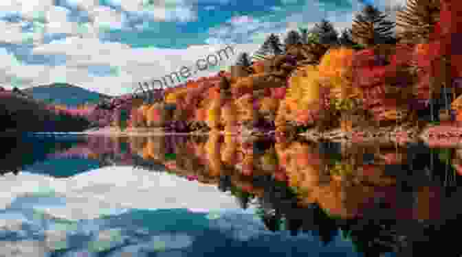 A Serene Mountain Lake Reflecting The Vibrant Colors Of Autumn. Outdoor Action And Adventure Photography