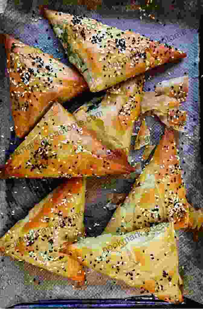 Golden Brown Spanakopita Triangles On A Serving Platter Greek And Chinese Cookbook: 2 In 1: Discover 140 Recipes For Easy And Healthy Food From Greece And China